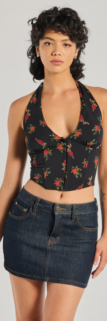 The Charming Ditsy Rose Lace-Up Halter Corset Top in black brings edge and energy to your vibe, ready to elevate any festival look or concert outfit.