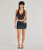 The Charming Ditsy Rose Lace-Up Halter Corset Top in black with a modern design and trendy look is part of the latest women's tops collection to elevate your 2025 wardrobe.