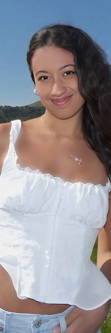 From bold to effortless, the Effortless Beauty Jacquard Woven Corset Top lets you define your vibe with ivory tops that speak your style.