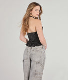 The Pretty Flair Polka Dot Satin Halter Top in black with a modern design and trendy look is part of the latest women's tops collection to elevate your 2025 wardrobe.
