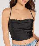 Stay on-trend this season with the Sultry Stunner Lace-Up Satin Crop Top in black, a must-have for creating stylish and effortless spring outfits for women.