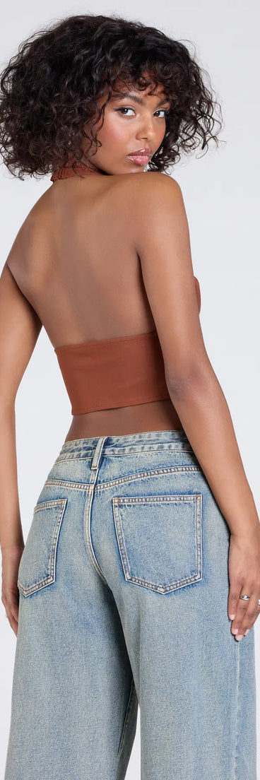 With its midriff cut and trend-forward fit, the Sultry Trend Buckle Strap Halter Crop Top is a rust crop top made to pair with skirts, denim, or whatever vibe you're feeling this season.