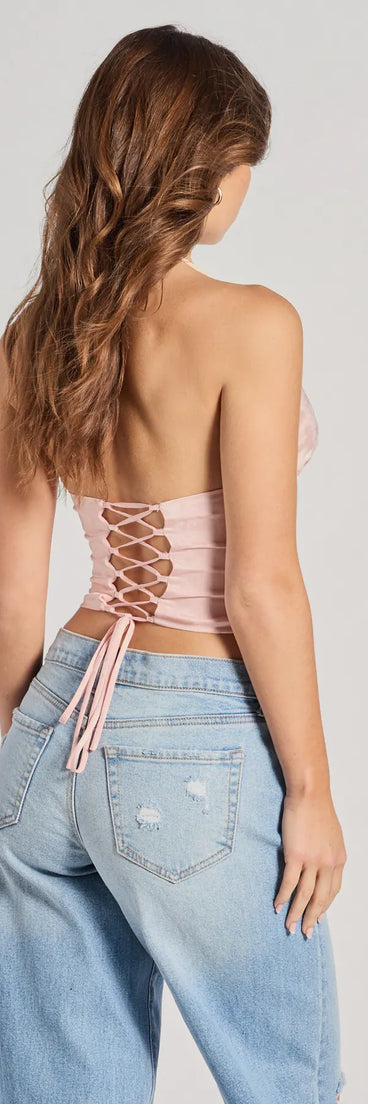 For college campus looks, game day outfits, or a bold going-out vibe, the All The Feels Halter Lace-Up Floral Satin Corset Top is an on-trend pink crop top that easily styles with your favorite denim.