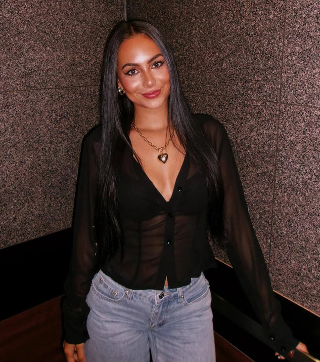 From bold to effortless, the Sheer To Be Seen Smocked Back Chiffon Button Top lets you define your vibe with black tops that speak your style.
