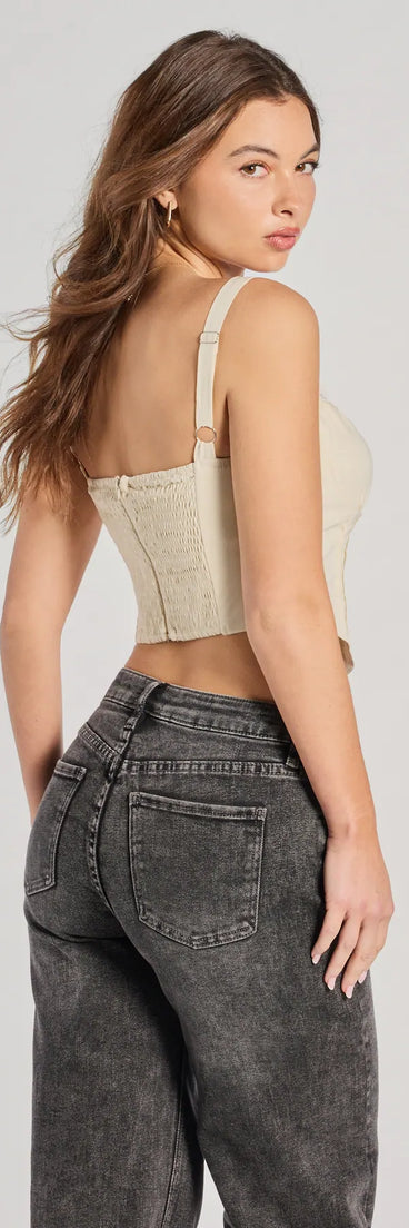 For college campus looks, game day outfits, or a bold going-out vibe, the Delicately Femme Lace Trim Corset Top is an on-trend ivory crop top that easily styles with your favorite denim.