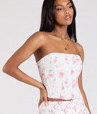 Stay on-trend this season with the Call Me Cutie Lace-Up Floral Eyelet Corset Top in white, a must-have for creating stylish and effortless spring outfits for women.