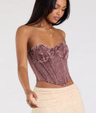 With its midriff cut and trend-forward fit, the Vintage Vibes Strapless Lace-Up Denim Corset Top is a red crop top made to pair with skirts, denim, or whatever vibe you're feeling this season.