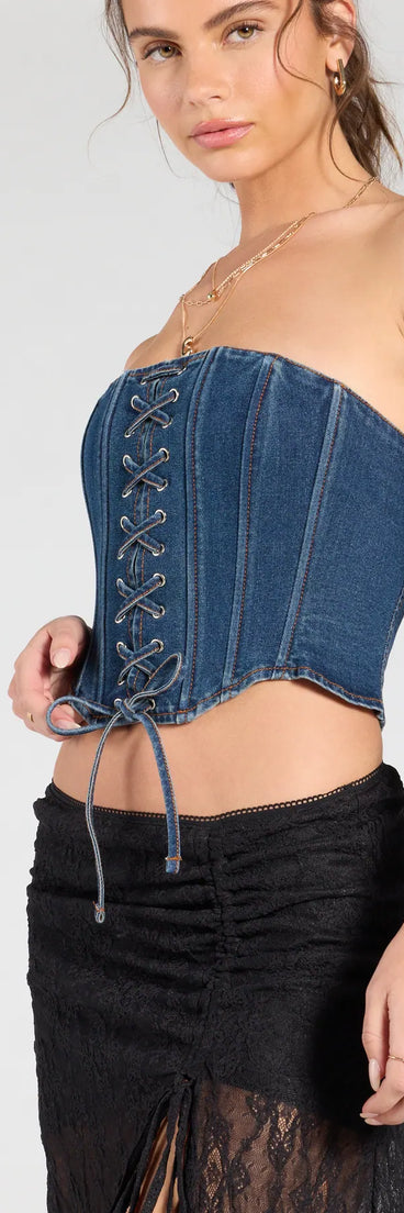 Stay on-trend this season with the Trendy Style Lace-Up Denim Corset Top in dark denim wash, a must-have for creating stylish and effortless fall outfits for women.