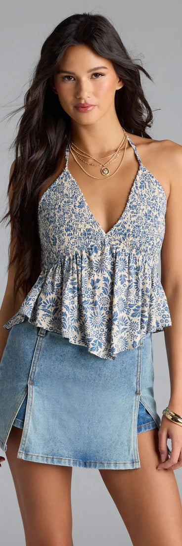 The Breezy Cutie Paisley Halter Babydoll Top in navy blue brings edge and energy to your vibe, ready to elevate any festival look or concert outfit.