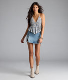 The Breezy Cutie Paisley Halter Babydoll Top in navy blue brings edge and energy to your vibe, ready to elevate any festival look or concert outfit.