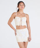Stay on-trend this season with the Boho Muse Lace-Up Embroidered Crop Top in natural, a must-have for creating stylish and effortless spring outfits for women.