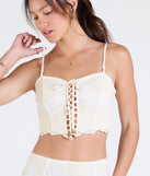 Stay on-trend this season with the Boho Muse Lace-Up Embroidered Crop Top in natural, a must-have for creating stylish and effortless spring outfits for women.