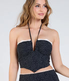 Stay on-trend this season with the Delightful Duo Halter Polka Dot Crop Top in black, a must-have for creating stylish and effortless spring outfits for women.