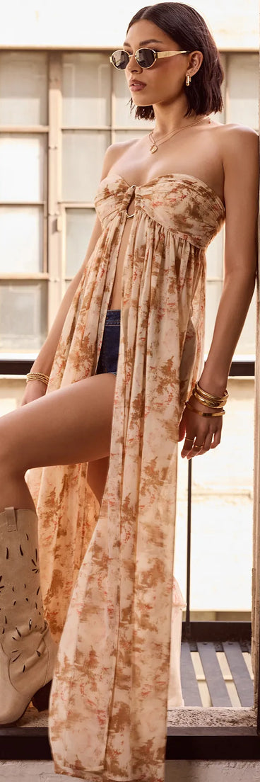 Add a summer refresh to your look with the Wanderlust Calling Strapless Abstract Flowy Tunic Top, a trendy top in natural made for easy styling for any vibe.