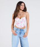 From bold to effortless, the Cheerful Blooms Floral Lace-Up Eyelet Bustier lets you define your vibe with white tops that speak your style.
