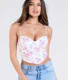 From bold to effortless, the Cheerful Blooms Floral Lace-Up Eyelet Bustier lets you define your vibe with white tops that speak your style.