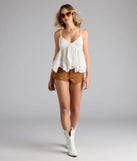 With its midriff cut and trend-forward fit, the By The Beach V-Neck Halter Babydoll Crop Top is a white crop top made to pair with skirts, denim, or whatever vibe you're feeling this season.