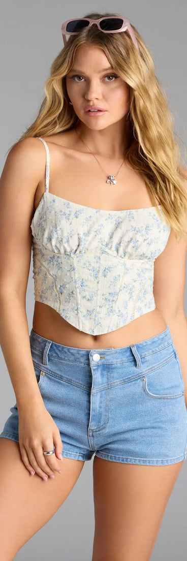 With its midriff cut and trend-forward fit, the Feeling The Bliss Floral Polka Dot Bustier is a ivory crop top made to pair with skirts, denim, or whatever vibe you're feeling this season.