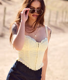 Stay on-trend this season with the Ray Of Sunshine Eyelet Lace Bustier in yellow, a must-have for creating stylish and effortless spring outfits for women.