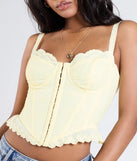 Stay on-trend this season with the Ray Of Sunshine Eyelet Lace Bustier in yellow, a must-have for creating stylish and effortless spring outfits for women.