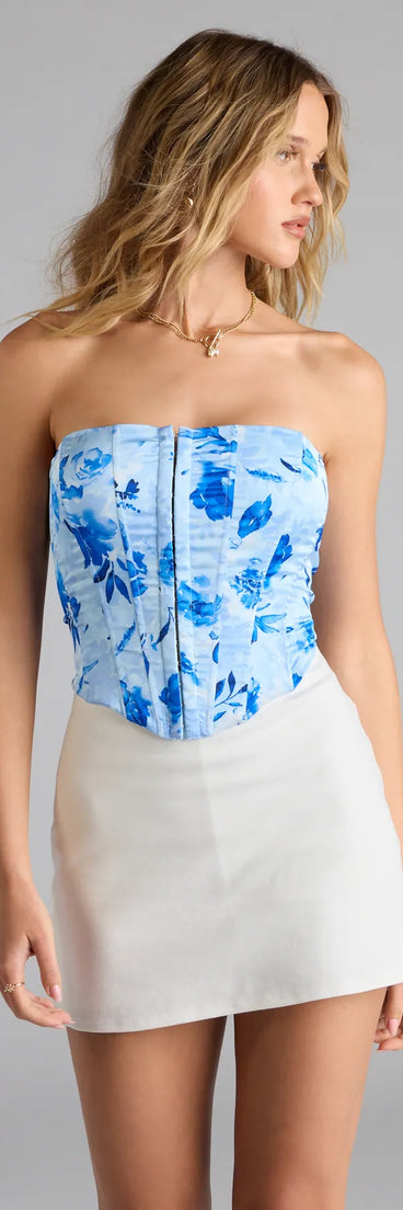 Trendy women’s tops in blue, like the Bold Blooms Lace-Up Floral Satin Corset Top, bring effortless style for fall layering, lounging, or going out.