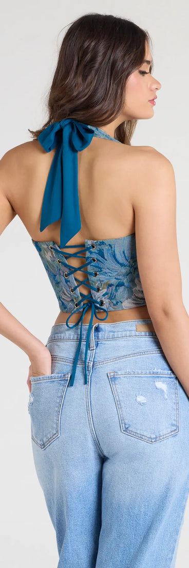 For college campus looks, game day outfits, or a bold going-out vibe, the Day By Day Halter Lace-Up Tapestry Corset Top is an on-trend teal crop top that easily styles with your favorite denim.