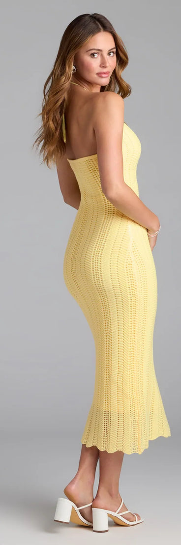 The Sea Salt Vibes Halter Crochet Midi Dress in yellow features a flattering fit and mid-calf hem, redefining effortless midi dresses for any occasion.