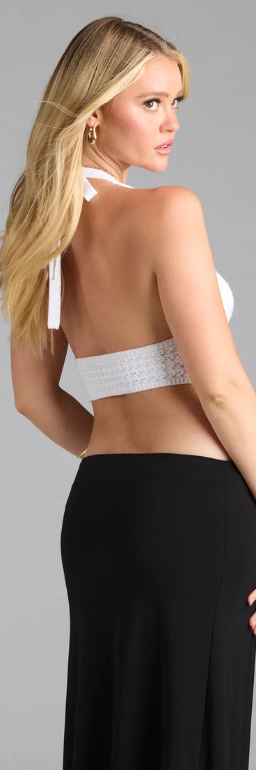 For college campus looks, game day outfits, or a bold going-out vibe, the Stroll In The Sand Halter Crochet Crop Top is an on-trend white crop top that easily styles with your favorite denim.