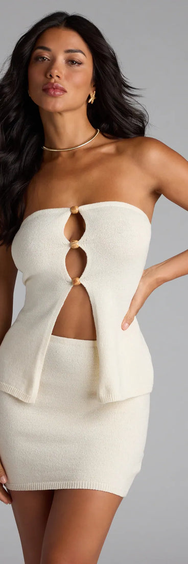 Pack light and style smarter in the Bohemian Babe Knit Cutout Tube Top, a ivory vacation outfit essential that blends breezy comfort with destination-ready detail.