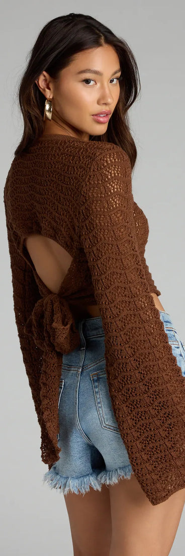 Complete your look with the Tied Up In Vibes Crochet Sweater, a trendy brown top that’s ready to pair with anything in your fall rotation.