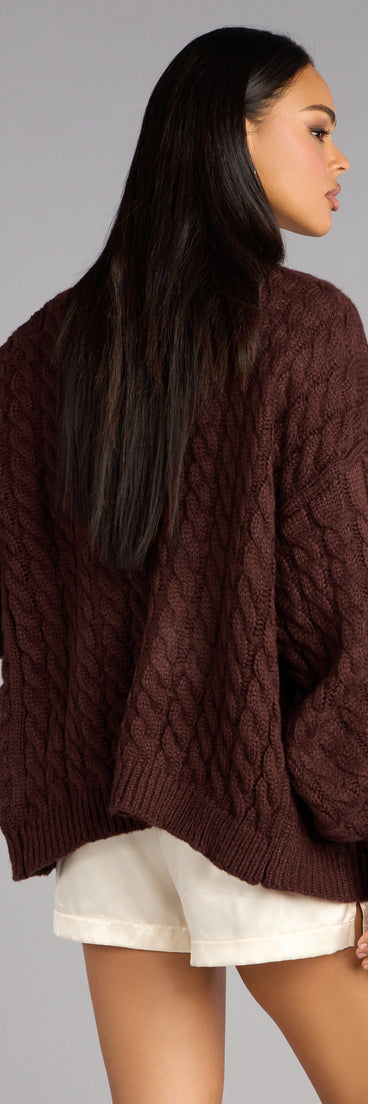 This brown piece brings trend-right energy to the Wrap Me Up Cable Knit Cardigan, perfect for fall outfits that stand out.