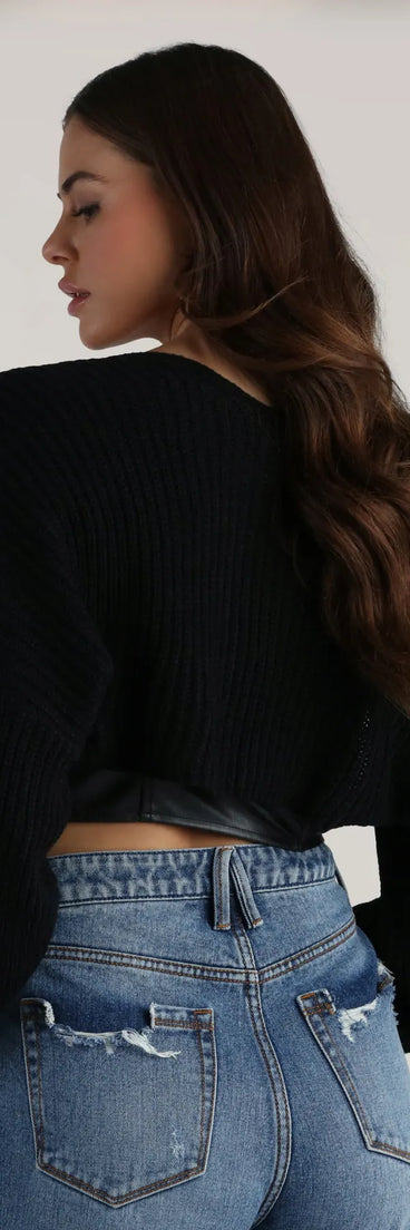 Add the perfect finish with the Sweet And Cozy Oversized Knit Sweater Bolero, a black bolero that refines your look with effortless charm.