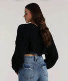 Add the perfect finish with the Sweet And Cozy Oversized Knit Sweater Bolero, a black bolero that refines your look with effortless charm.