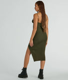 The Such A Serve Cutout Strappy Ribbed Knit Midi Dress is a cozy sweater dress made from soft, stretchy fabric, perfect for layering on chilly winter days or dressing up as a warm holiday dress.