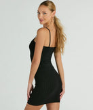 Revamp your 2025 wardrobe with this chic addition, the Simple Staple Ribbed Knit Bodycon Mini Dress in black, perfect for elevating your style in the new year.