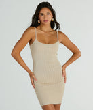 The Simple Staple Ribbed Knit Bodycon Mini Dress offers a versatile spring style, with a cozy sweater knit perfect for office wear, casual day outings, or layered outfits.