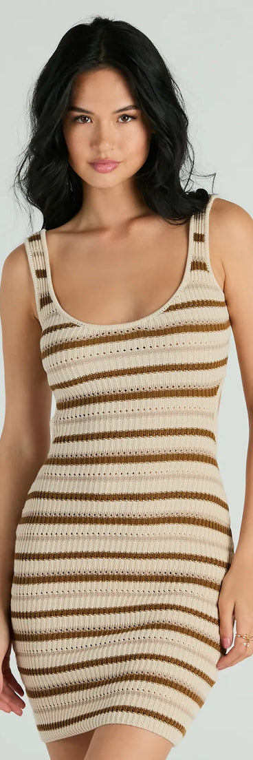 The Perfect Match Sleeveless Striped Ribbed Knit Mini Dress offers a versatile winter style, with a cozy sweater knit perfect for office wear, casual day outings, or layered winter outfits.