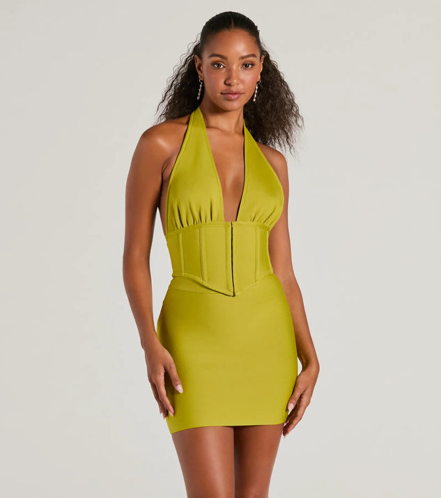 The waist-defining bodice style of the Sculpted Sultry Bandage Halter Crop Top in chartreuse is perfect for making a statement with your outfit and provides the structure, molded cups, or lace-up details that capture the corset trend