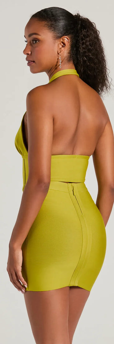 The waist-defining bodice style of the Sculpted Sultry Bandage Halter Crop Top in chartreuse is perfect for making a statement with your outfit and provides the structure, molded cups, or lace-up details that capture the corset trend