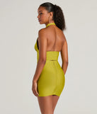 The waist-defining bodice style of the Sculpted Sultry Bandage Halter Crop Top in chartreuse is perfect for making a statement with your outfit and provides the structure, molded cups, or lace-up details that capture the corset trend
