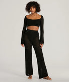 The Boho Cutie Bell Sleeve Crochet Crop Top is a cozy black sweater top crafted from textured knits, perfect for layering in winter outfits or adding warmth to a casual day look.