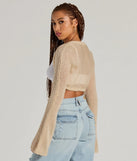 Wrap up in style with the Snuggly Style Long Sleeve Fuzzy Knit Bolero, a cozy taupe sweater for women designed for night-out looks, everyday outfits, or as a chic layering piece for the colder months.