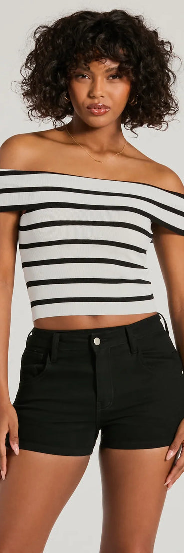 The Just Your Stripe Off-The-Shoulder Crop Top is a cozy ivory sweater top crafted from textured knits, perfect for layering in winter outfits or adding warmth to a casual day look.
