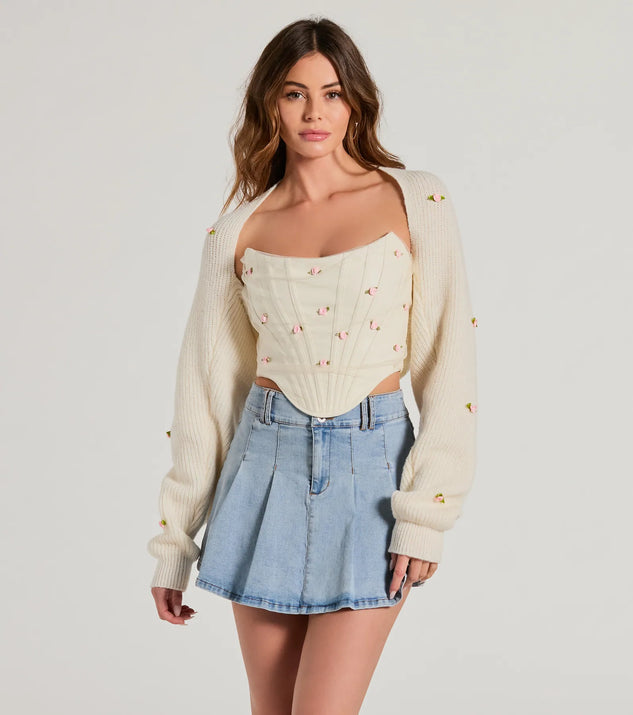 Wrap up in style with the The Sweetest Floral Rosette Long Sleeve Knit Bolero, a cozy ivory sweater for women designed for night-out looks, everyday outfits, or as a chic layering piece for the colder months.