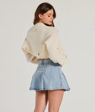Wrap up in style with the The Sweetest Floral Rosette Long Sleeve Knit Bolero, a cozy ivory sweater for women designed for night-out looks, everyday outfits, or as a chic layering piece for the colder months.