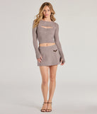 The Sweet Crush Long Sleeve Cable Knit Sweater Topper is a cozy taupe sweater top crafted from textured knits, perfect for transitional weather outfits or adding a warm layer to a casual day look.