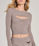 Layer-friendly Sweet Crush Long Sleeve Cable Knit Sweater Topper is a chic, transitional taupe long-sleeve top with contemporary sleeves and neckline design, ideal for an elevated seasonal style or casual elegance.