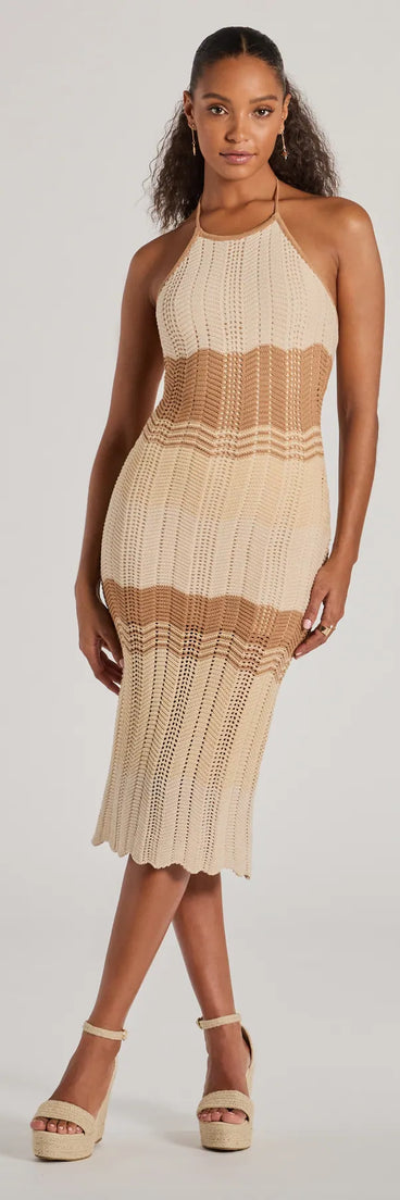 Make a statement in the Stylish Striped Halter Crochet Midi Dress, a natural bodycon dresses that blends unique design details with a tight silhouette for a head-turning holiday or New Year's eve dress.
