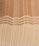 The Stylish Striped Halter Crochet Midi Dress is a natural dress, an essential holiday or NYE dress that pairs chic style with versatility making it perfect for cocktail events, New Year's Eve parties, or as a winter wedding guest look.