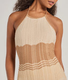 Make a statement in the Stylish Striped Halter Crochet Midi Dress, a natural bodycon dresses that blends unique design details with a tight silhouette for a head-turning holiday or New Year's eve dress.